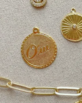 Oui Coin Charm