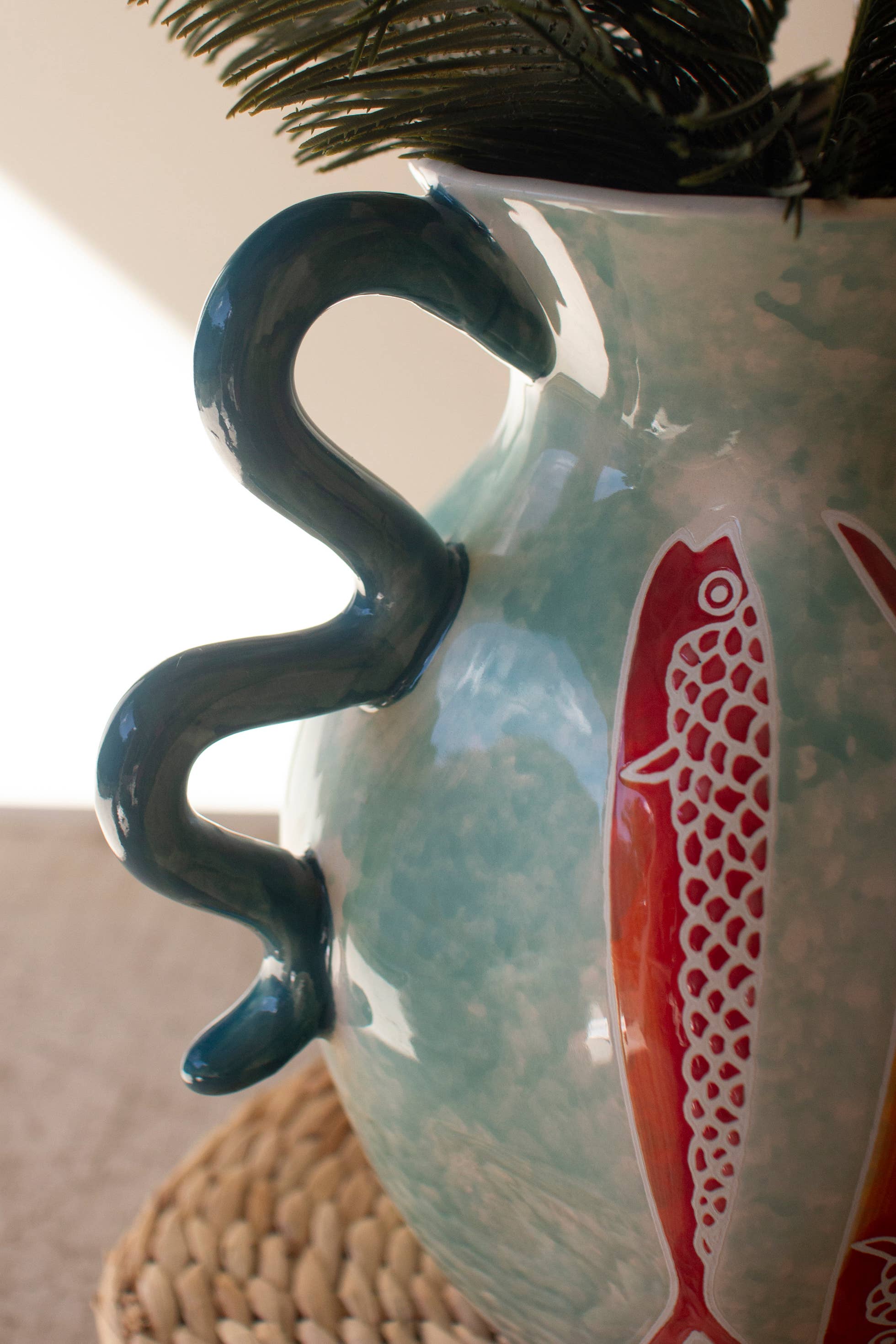 CERAMIC COLORFUL FISH VASE WITH BLUE SQUIGGLE HANDLES
