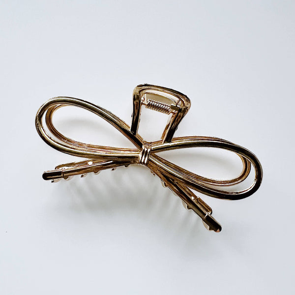 Gold bow hair claw