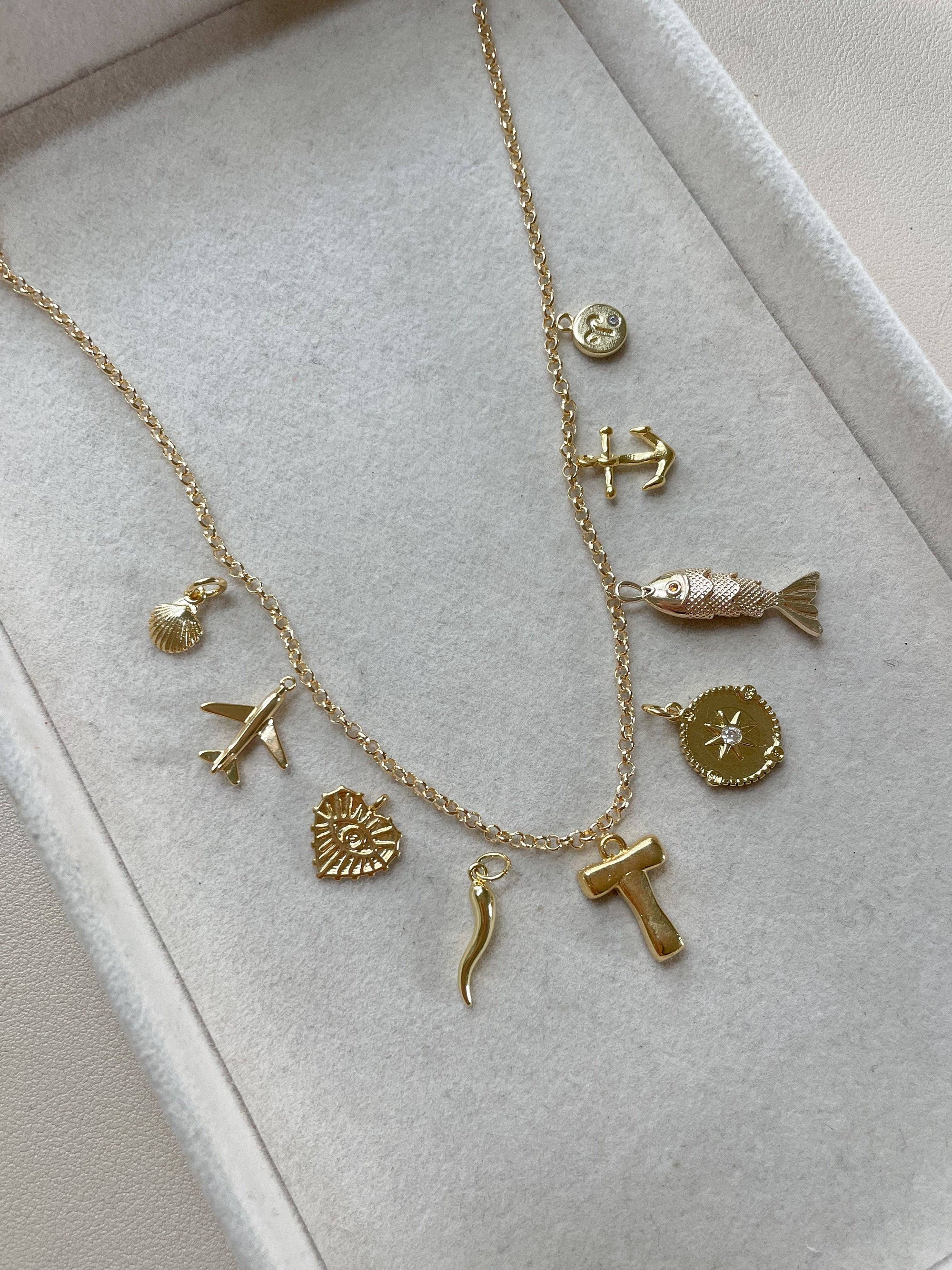 Gold Radiant Heart Charm
